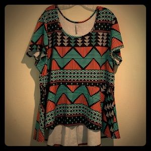 Discreet Peplum High-Low Top